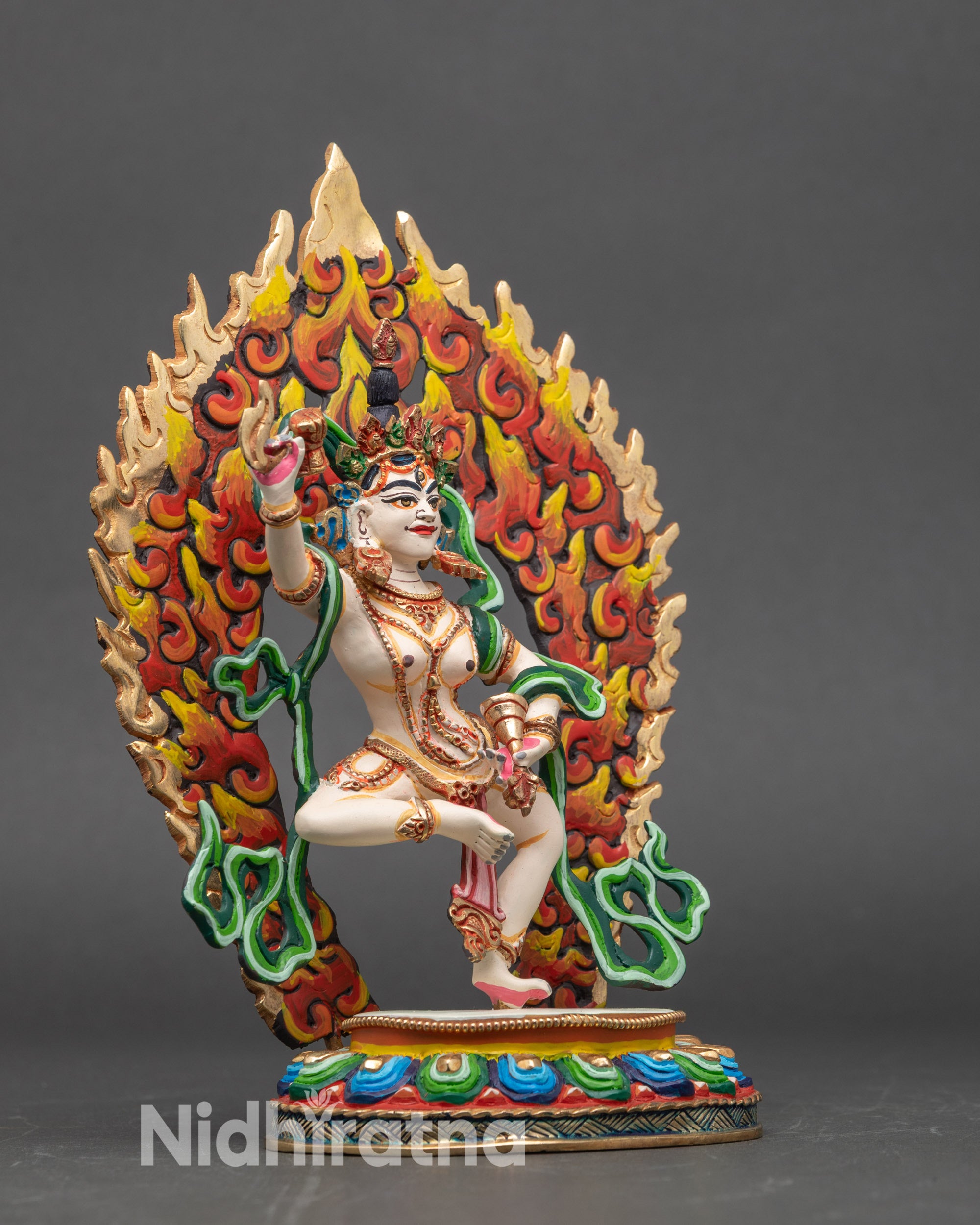 Side detail of Machig Labdron dancing on lotus with skull halo