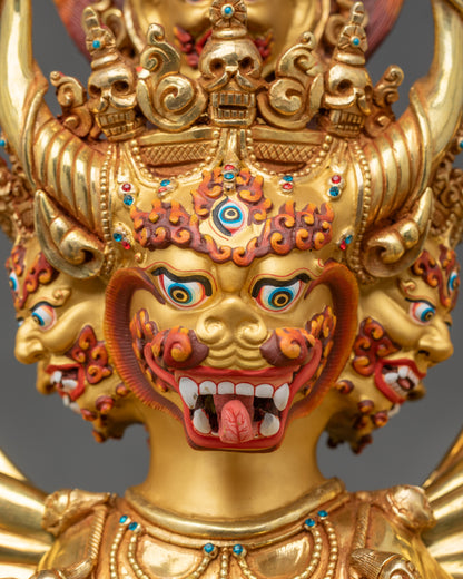 Side detail of Yamantaka union statue with flaming halo and sacred implements