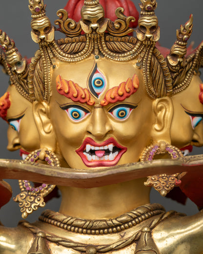 Side face close-up of Kalachakra Statue, showing intricate gold and copper work