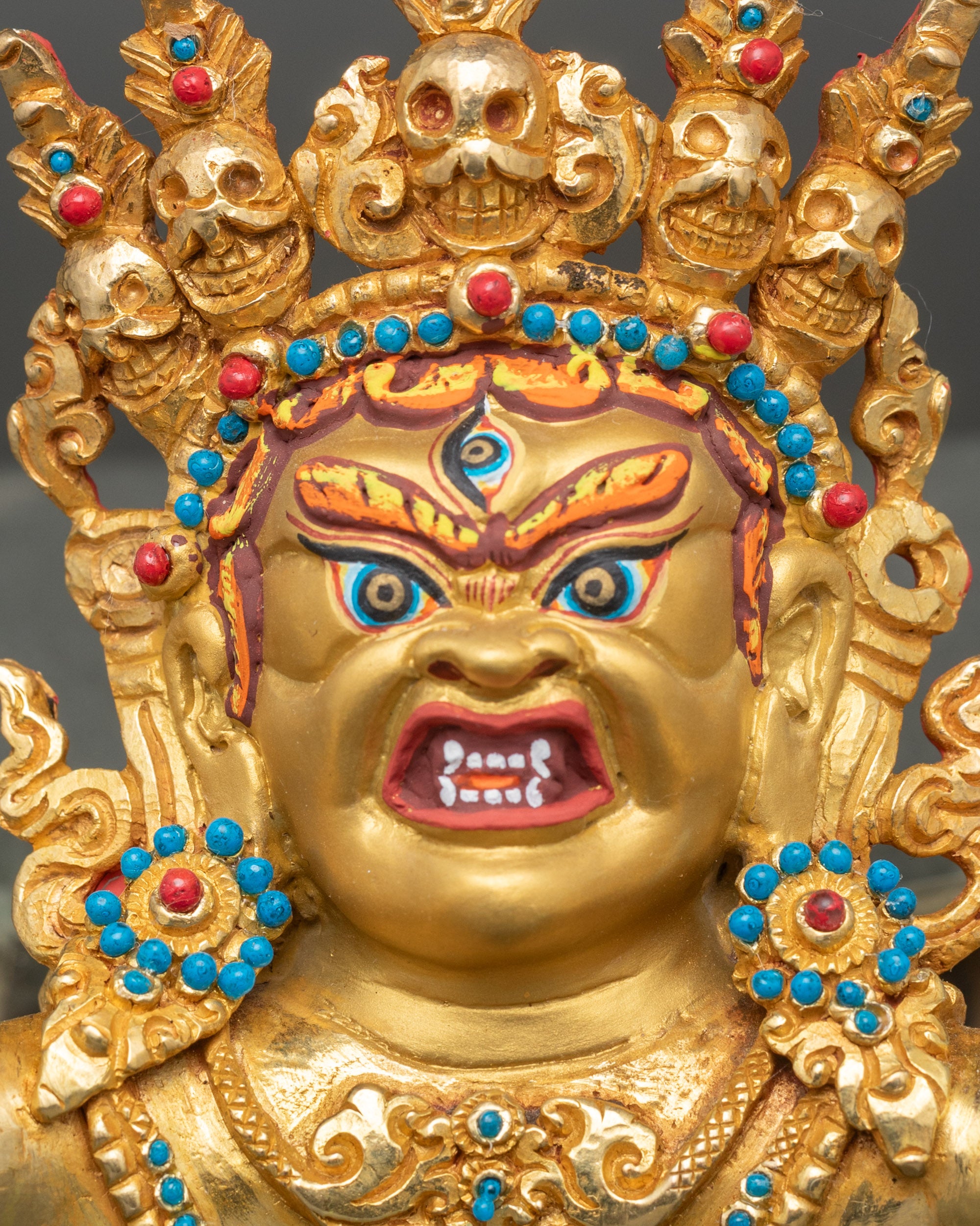 Side face close-up of Vajrakilaya Yab-Yum, intricate features and gold detailing