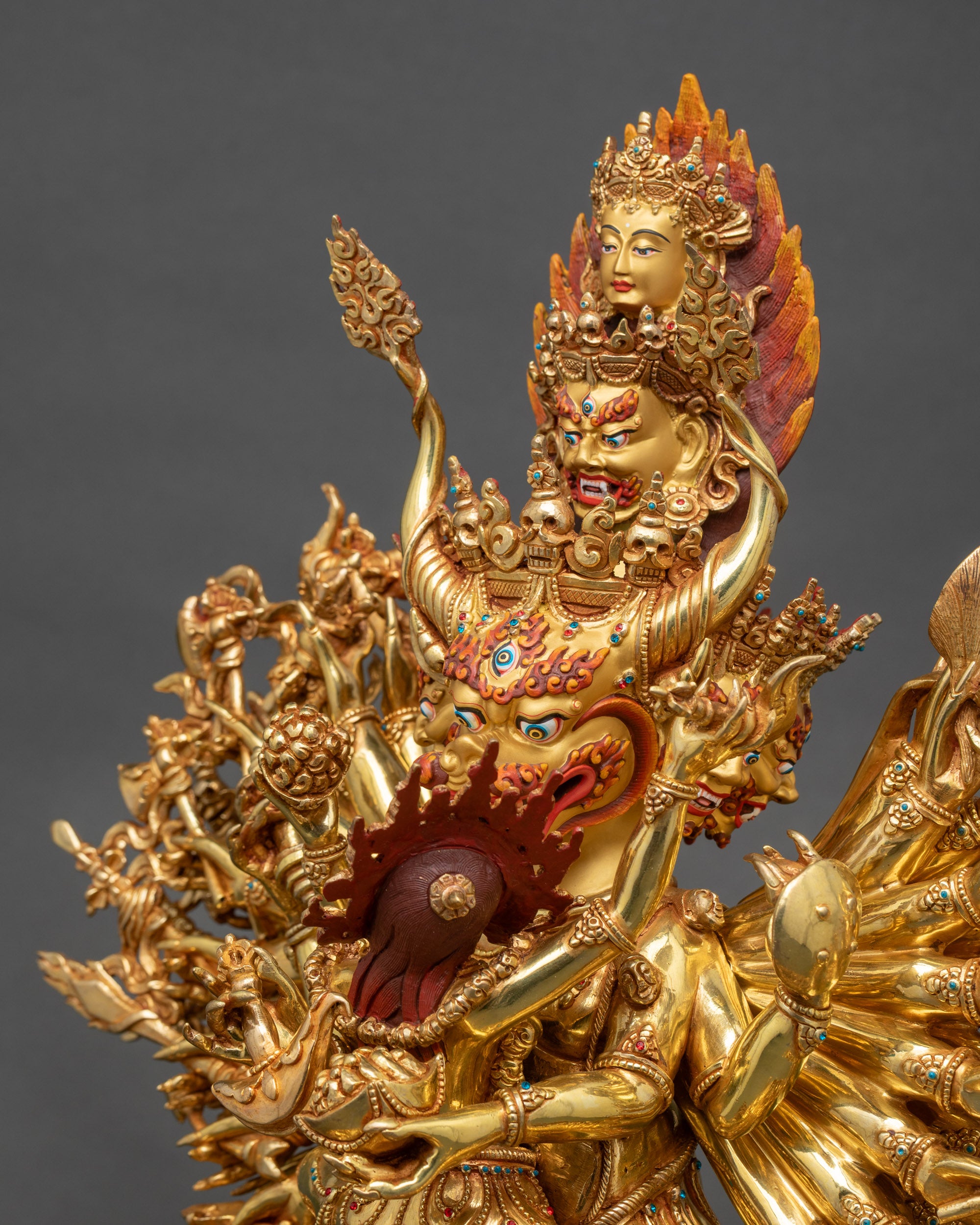 Side face close-up of Yamantaka deity with skull garland and wrathful features