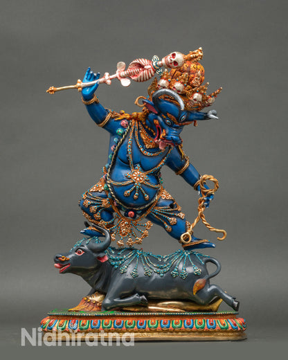 Side face close-up showing detailed horns, skull crown, third eye, and wrathful features