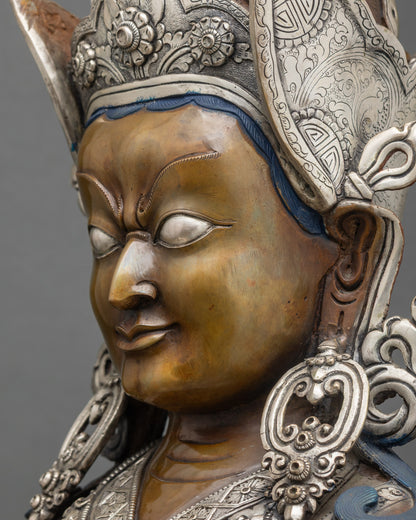 Side face detail Guru Padmasambhava, softly painted features, oxidized copper Buddhist art