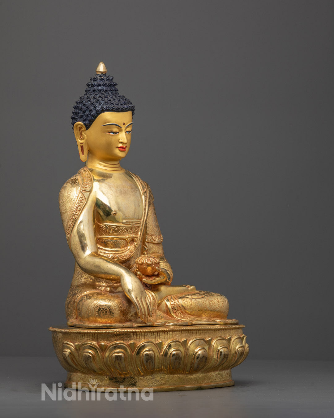 Side profile of 24k fire-gilded Shakyamuni Buddha Sculpture showing meditative posture