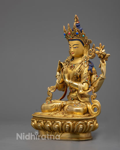 Chenrezig sculpture showing the lotus stem held in one hand and the semi‑precious stone adornments along the garment.