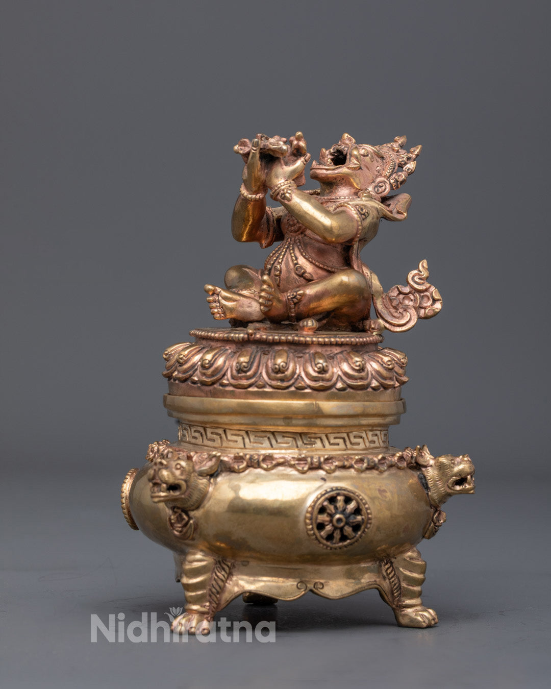 Side profile of Dorje Khadro Buddha statue with intricate hand-carved details