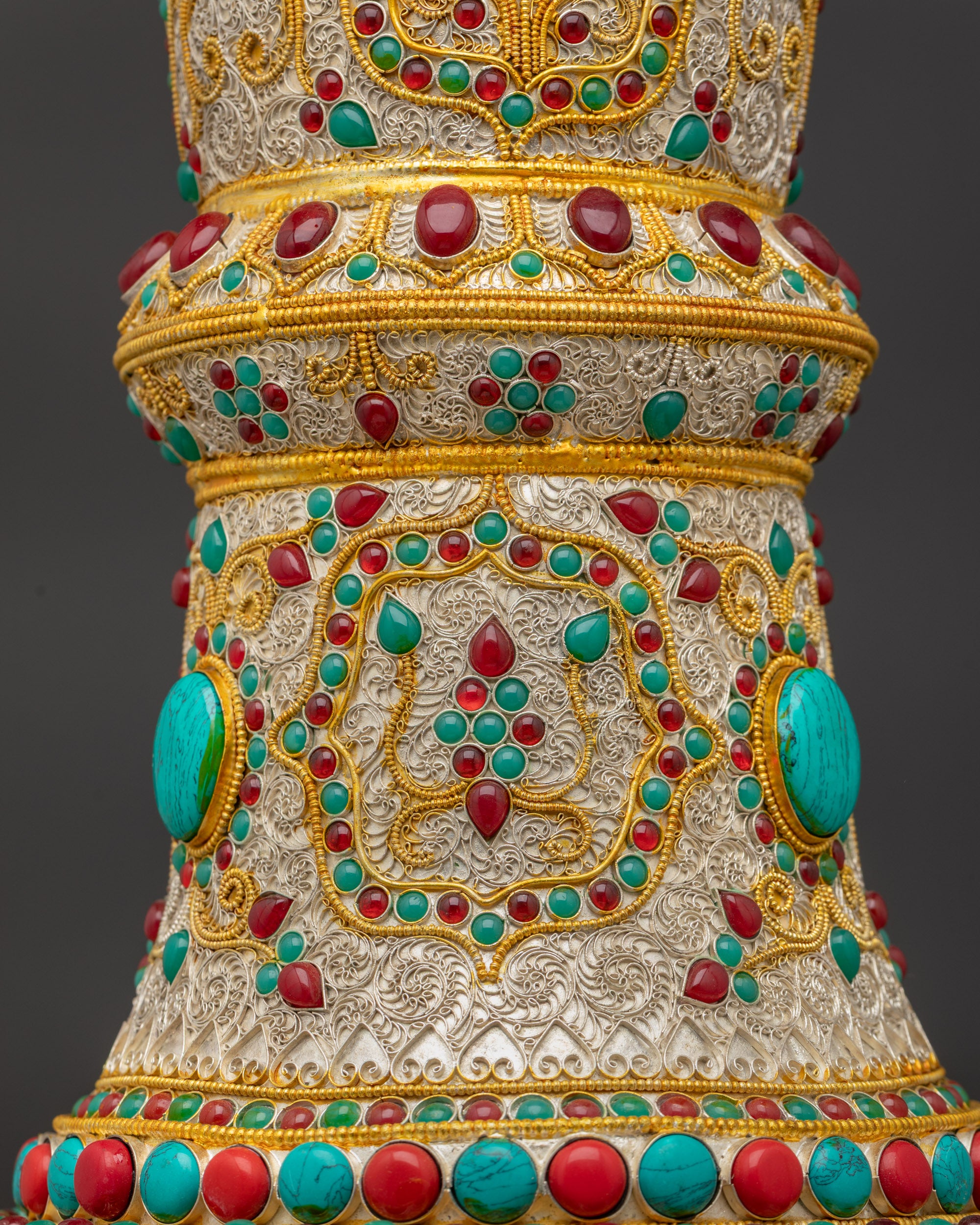 Side profile of Himalayan Buddhist Flower Vase adorned with intricate filigree work, copper base, and sacred gemstones symbolizing purity and devotion.