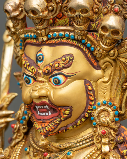 Side profile of Mahakala’s fierce face with skull crown and wisdom flames.