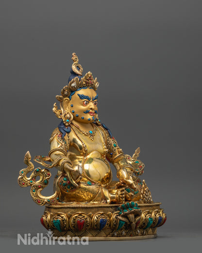 Side profile of Nepalese Dzambhala Statue seated on lotus