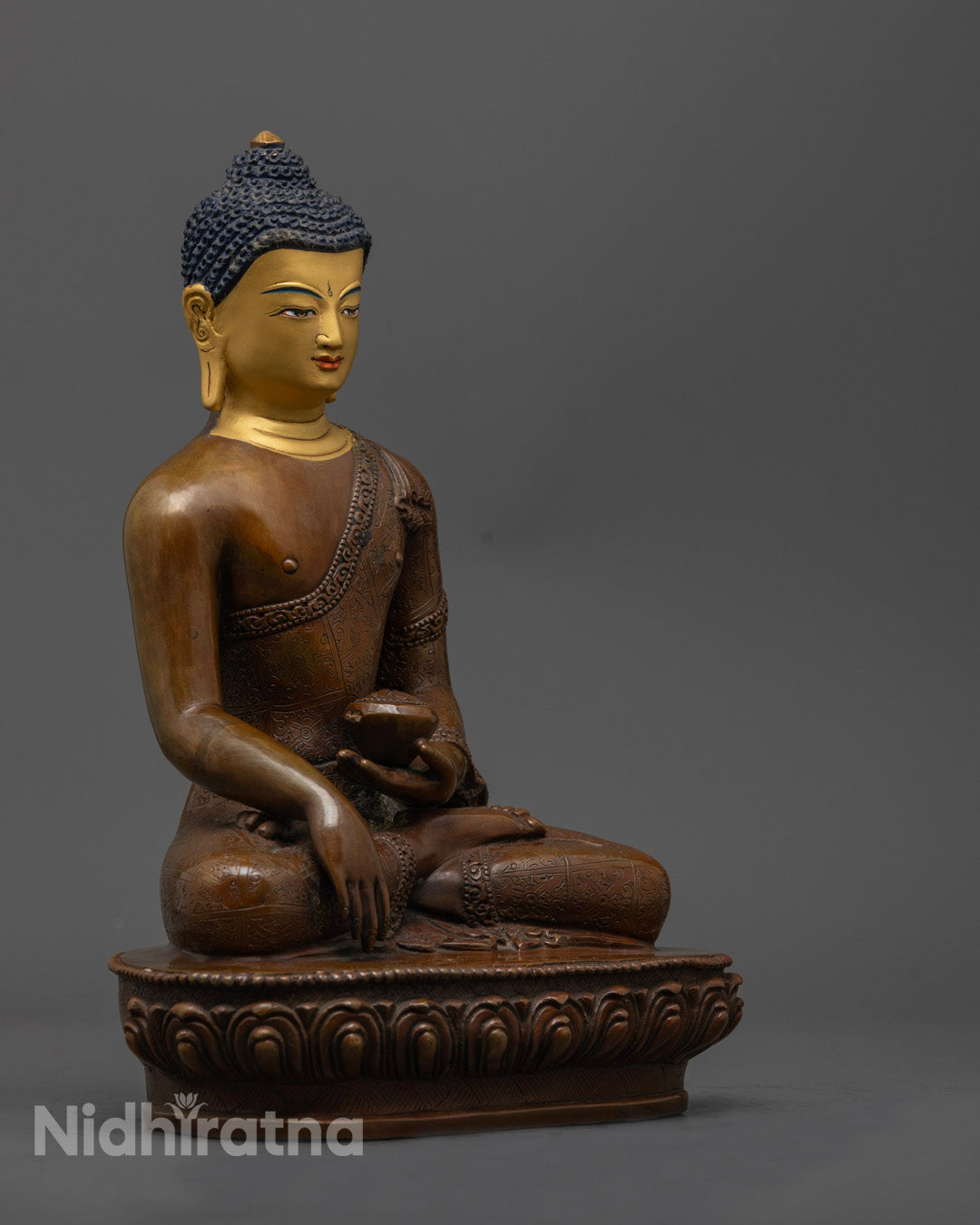 Shakyamuni Buddha Statue showing detailed lotus throne and vibrant acrylic color accents