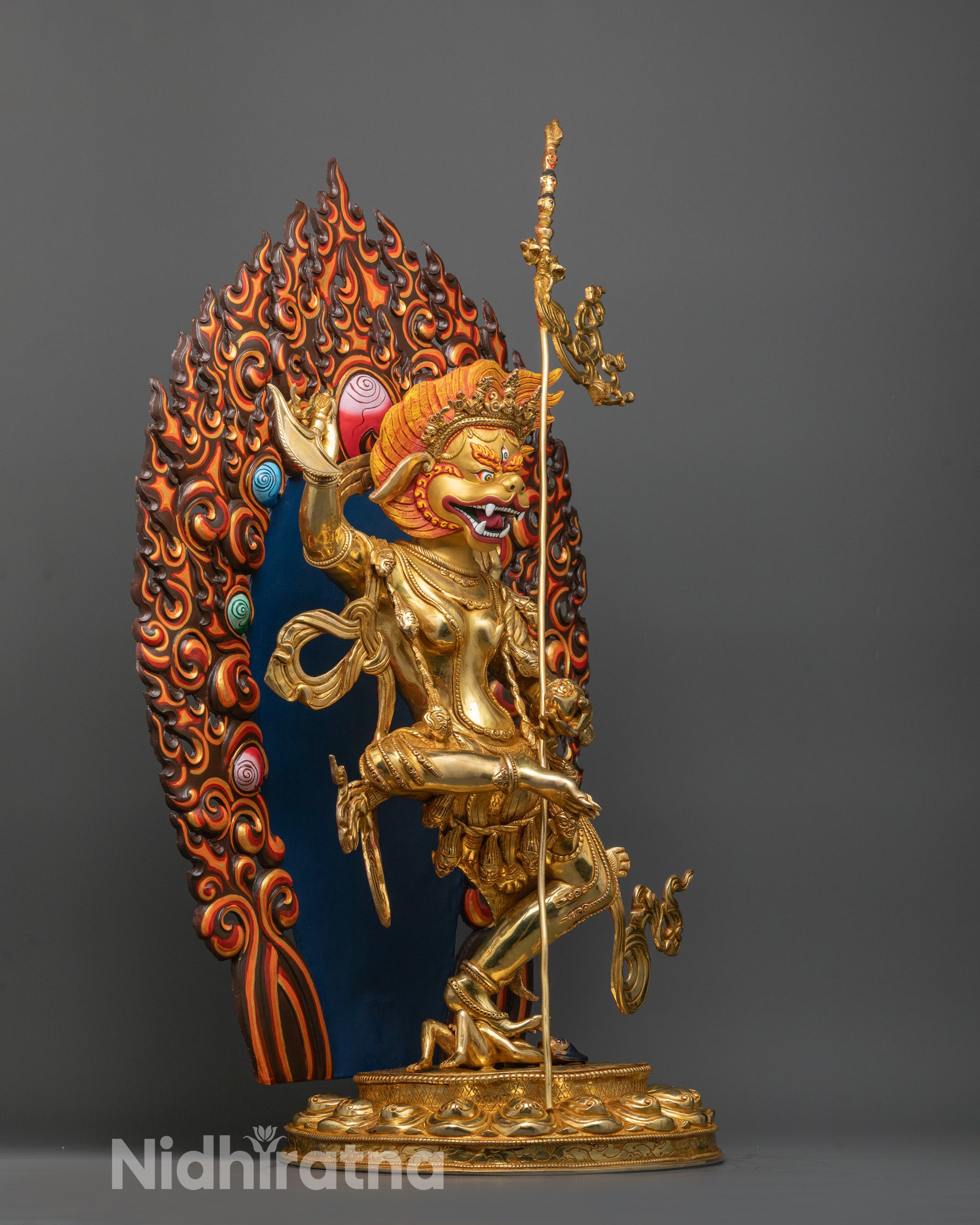 Side profile of Singha Mukha Dakini Statue showcasing curved ritual knife
