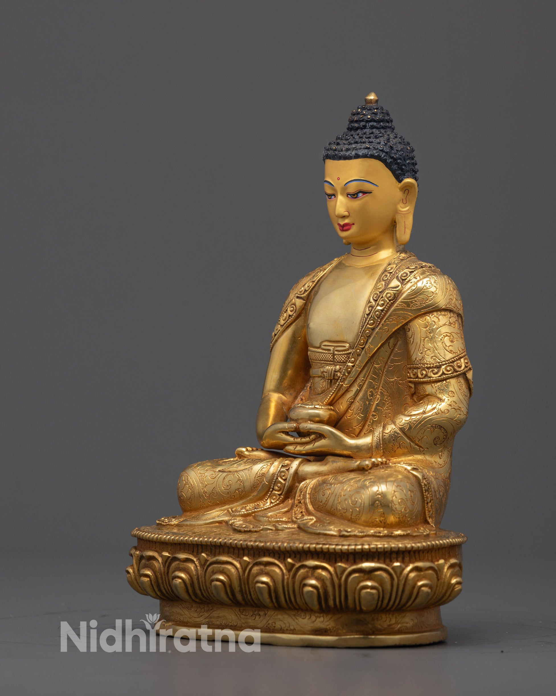Side profile of intricately carved Amitabha Buddha sculpture from Patan, Nepal
