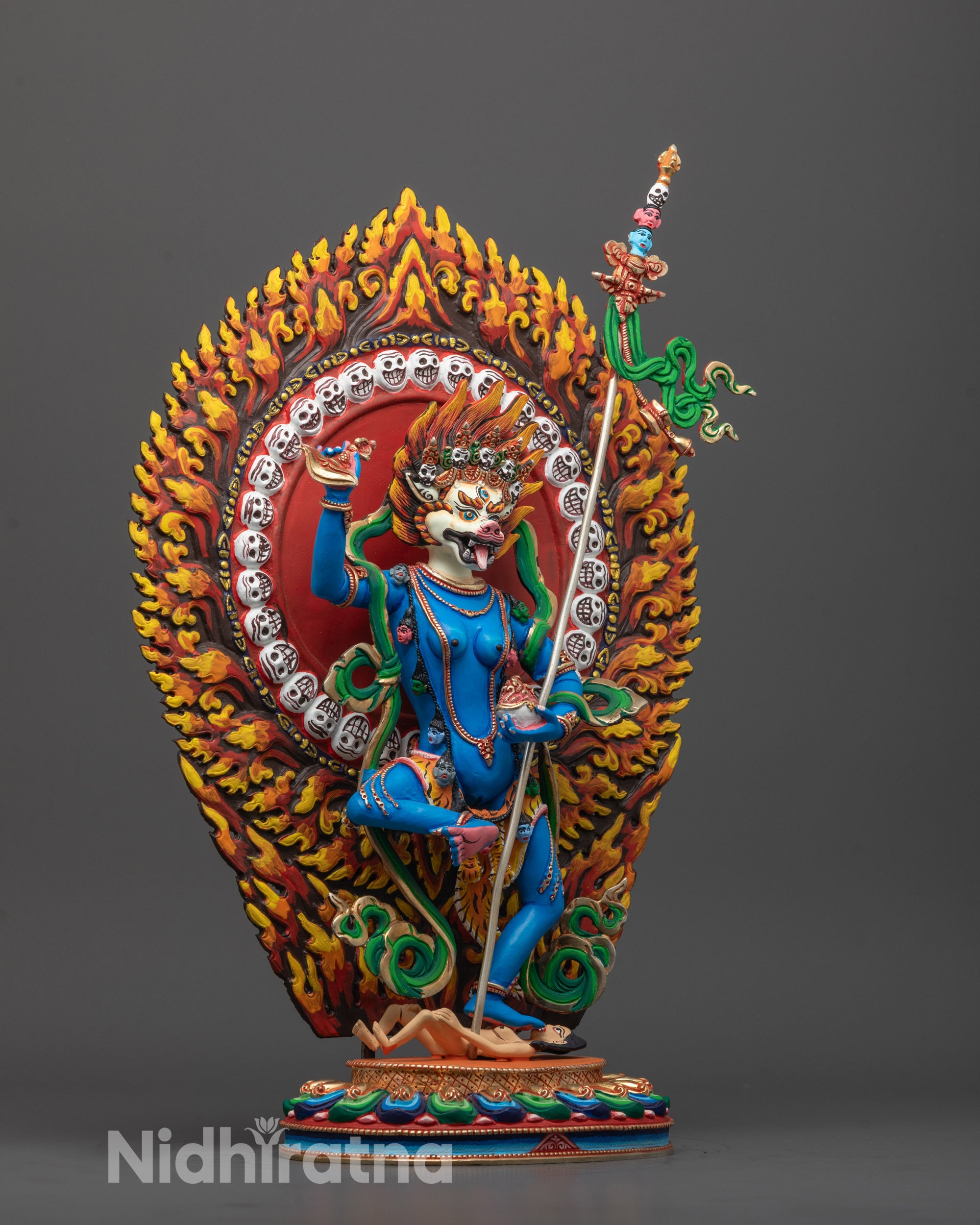 Side profile of the Blue Simha Mukha Sculpture showing intricate detailing on the skull-adorned halo