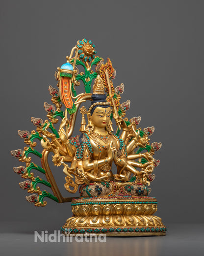 Side profile of the gilded Chundi statue highlighting detailed arm positions 