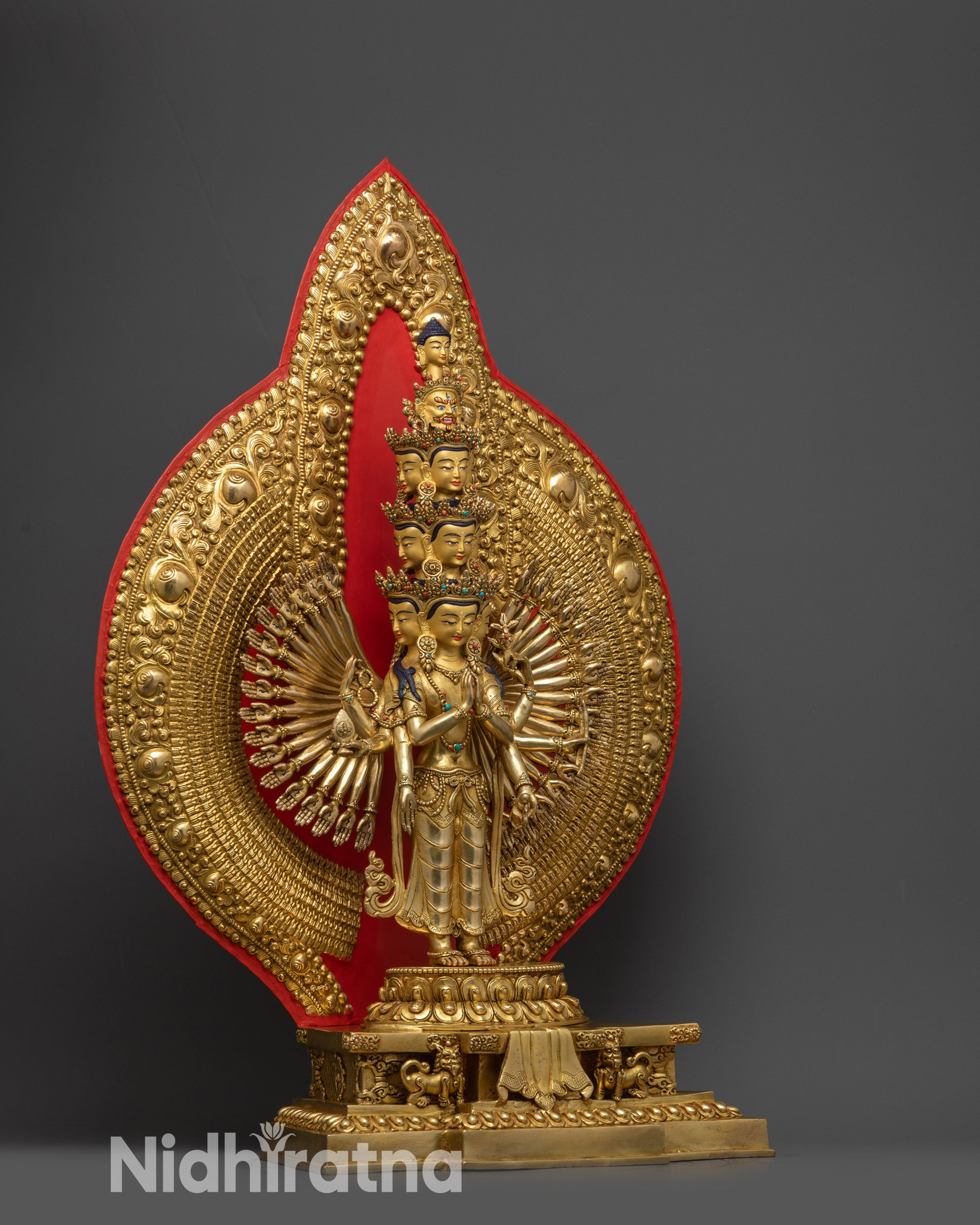 Side view 1000-Armed Chenrezig showing carved arms, patterns, and halo motifs

