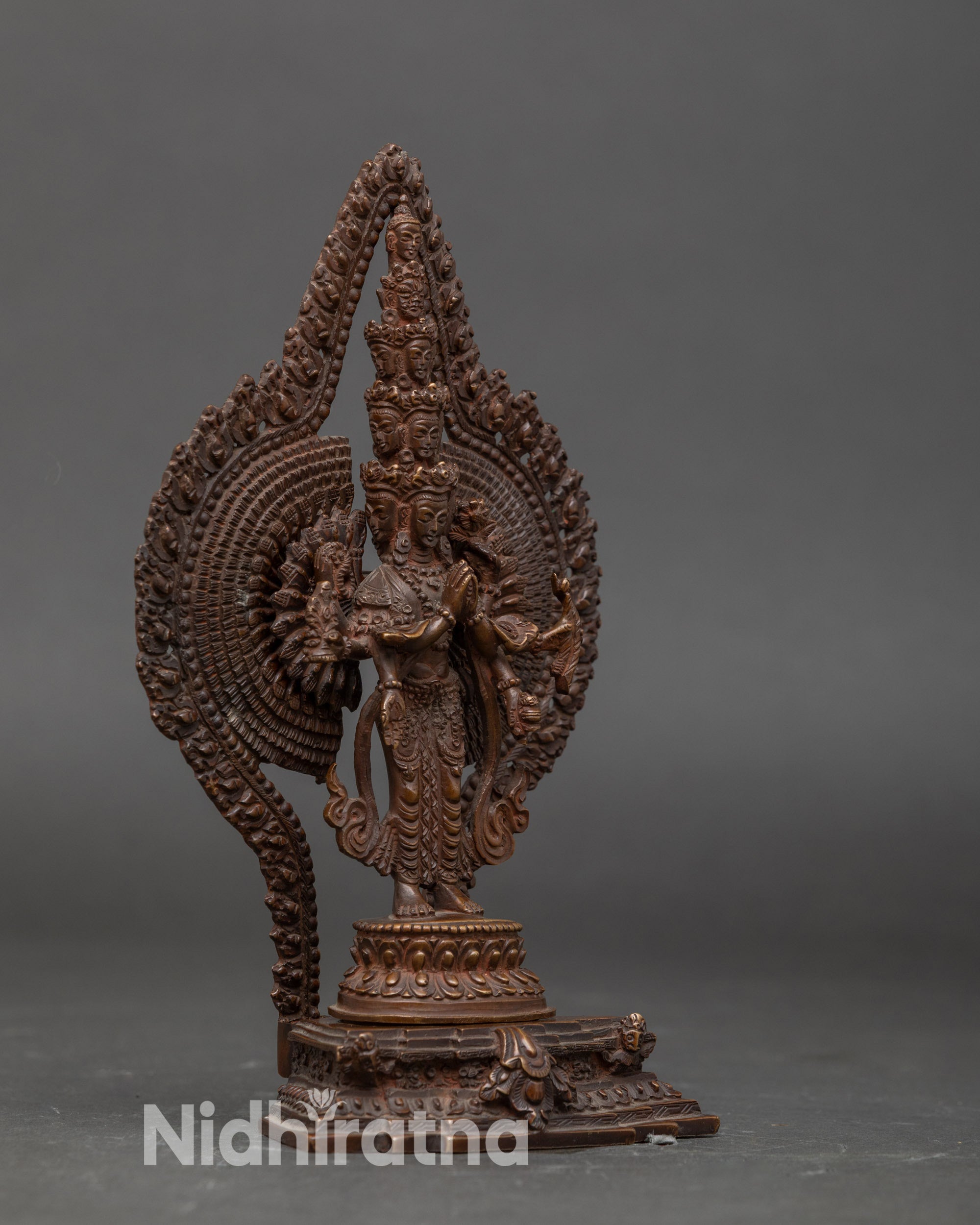 Side view 1000-Armed Chenrezig statue highlighting ornate arms and Himalayan craftsmanship