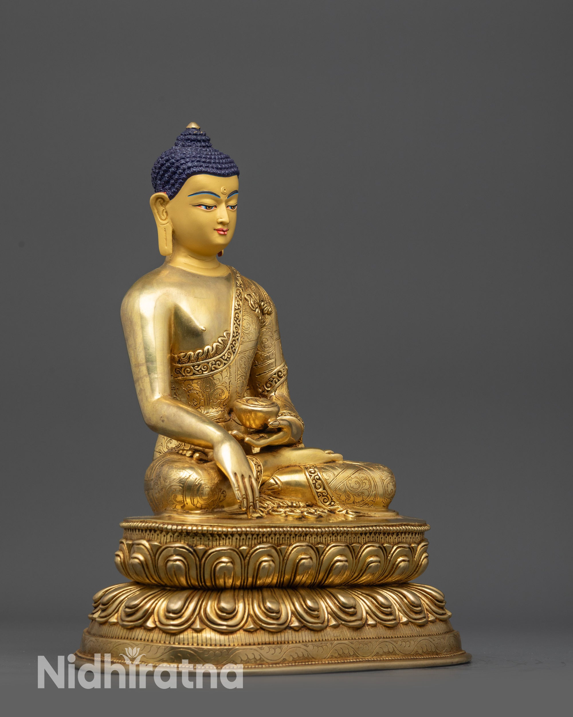 Side view 11-inch Shakyamuni Buddha statue highlighting lotus seat and detailed robe patterns