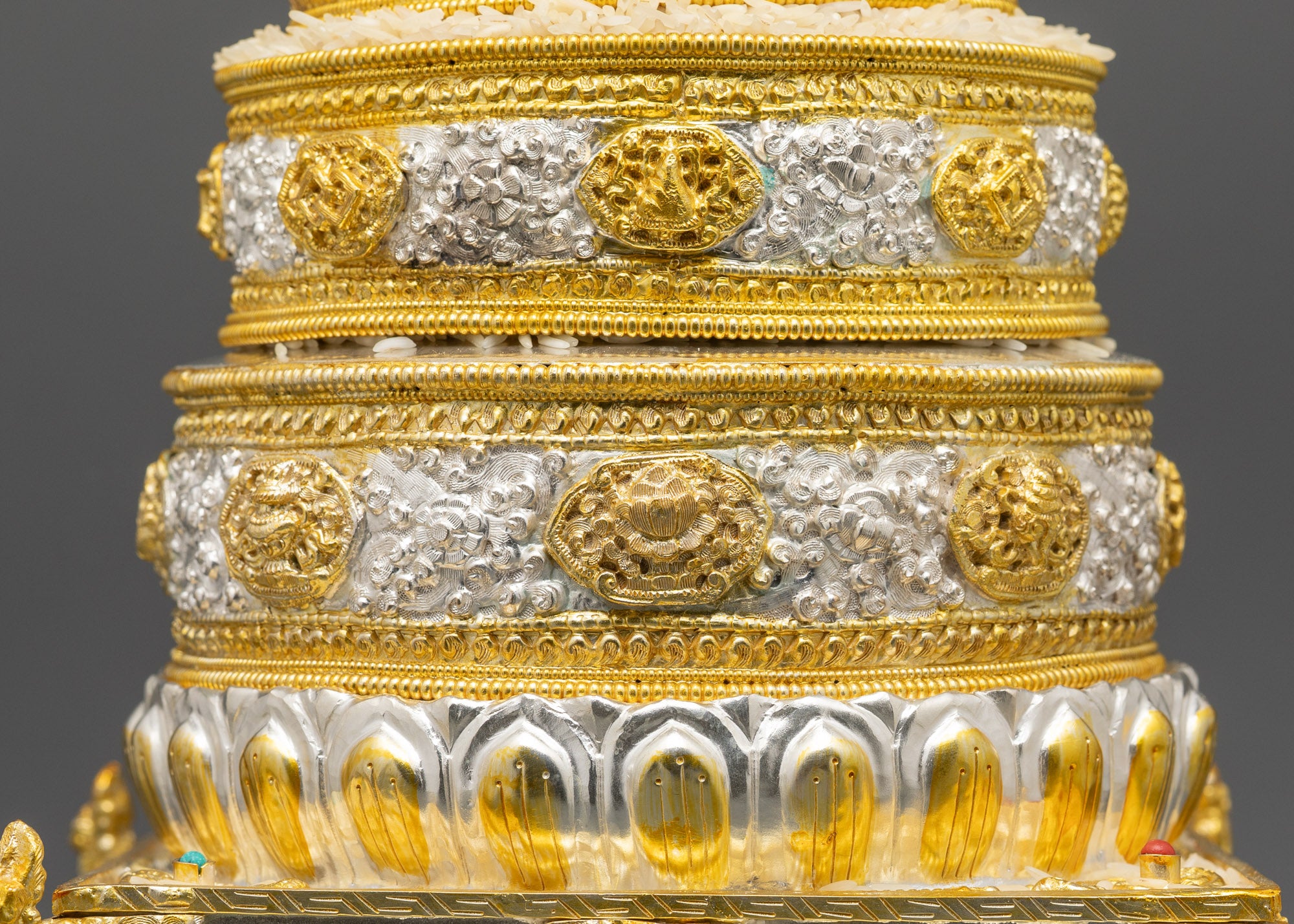 Side view 6" Copper Mandala with layered rings on a four-sided pedestal