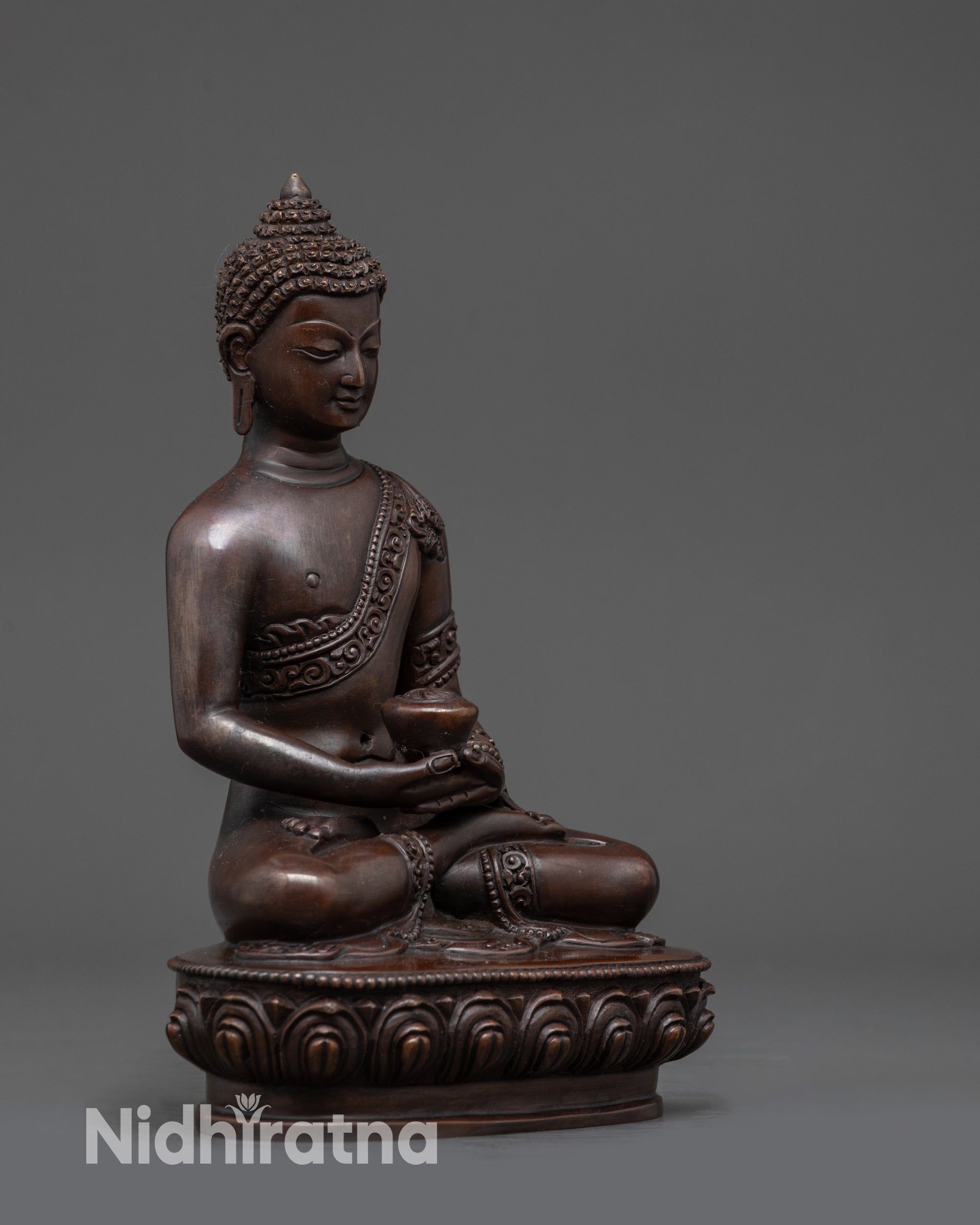 Side view Amitabha Buddha statue in monk’s robe with dhayna mudra and dark oxidized finish

