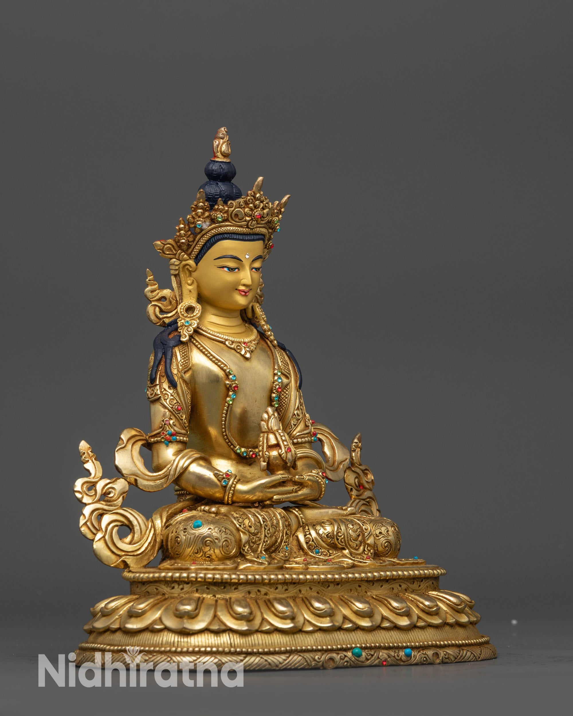 Side view Amitayus deity with detailed jewelry armlets and serene expression