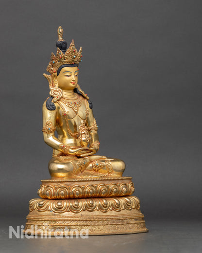 Side view Amitayus longevity Buddha statue seated on moon disc lotus holding vase