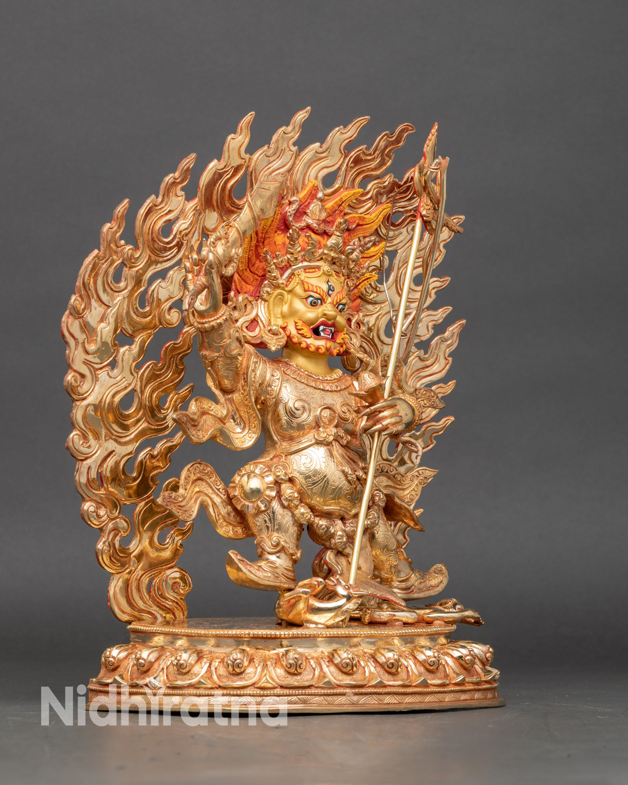 Side view Begtse Chen wrathful deity standing pose bow and arrow lance Nepalese art