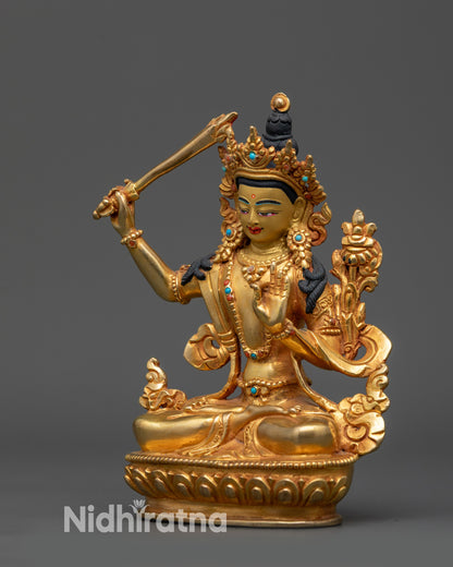 Side view Bodhisattva Manjushri sculpture with flower blooms beside shoulder
