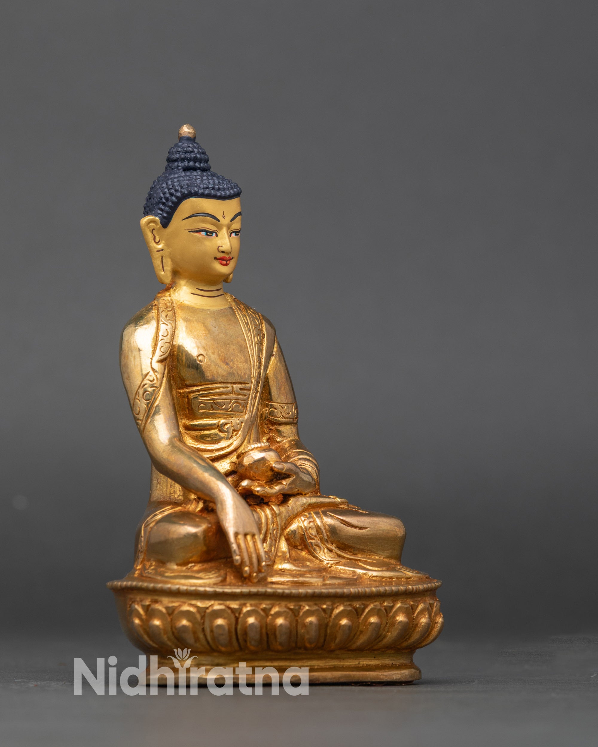 Side view Buddha Shakyamuni statue Bhumisparsha mudra 