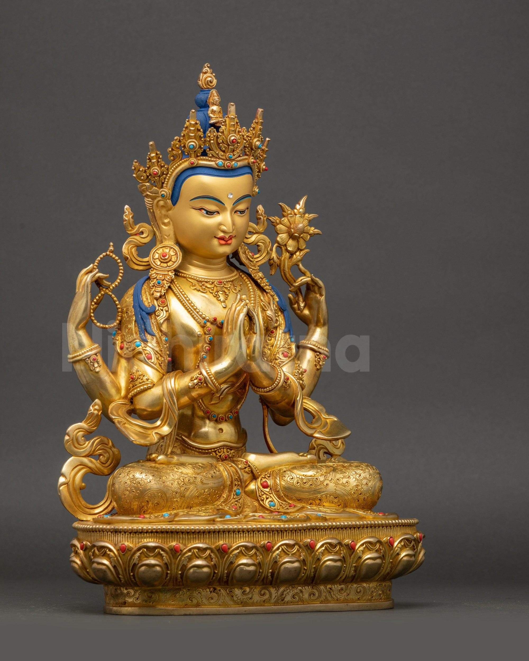 Side view Chenrezig four-armed statue handmade Newari Buddhist art Patan Nepal