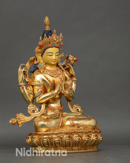 Side view Chenrezig statue seated in vajra posture on lotus pedestal