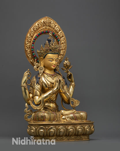Side view Chenrezig statue seated on lotus with gold-plated copper alloy and stones
