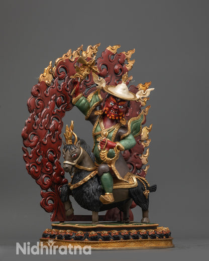 Side view Damchen Garwa Nagpo holding hammer staff and rosary