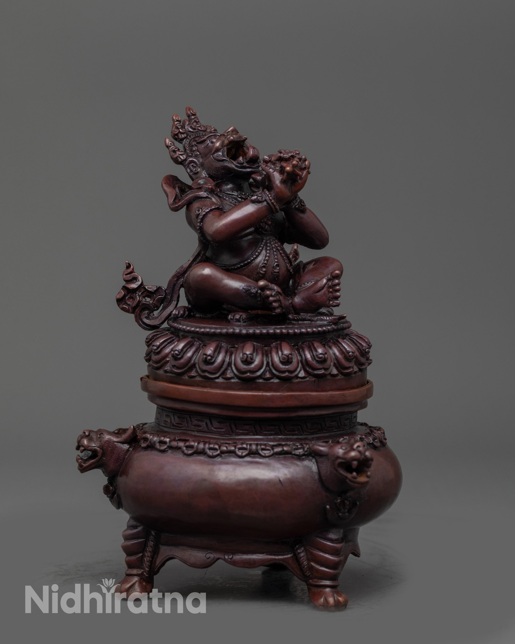 Side view Dorje Khadro Statue showing vajra and tiger-skin lower garment details
