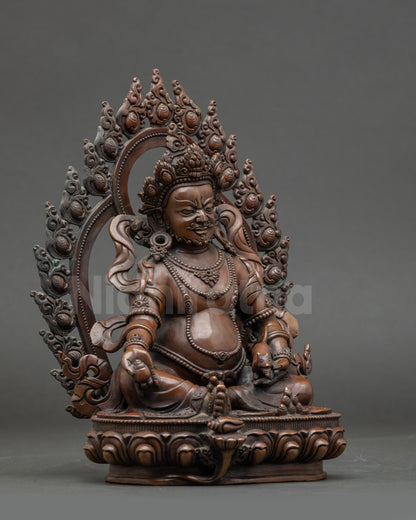 Side view Dzambhala wealth deity statue, chemically oxidized Nepalese handmade art