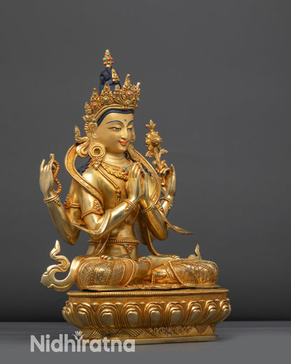 Side view Four-Armed Chenrezig Statue with swirling robes and lotus seat
