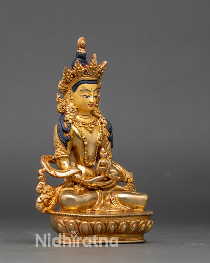 Side view Golden Amitayus statue meditative pose longevity and healing mudras