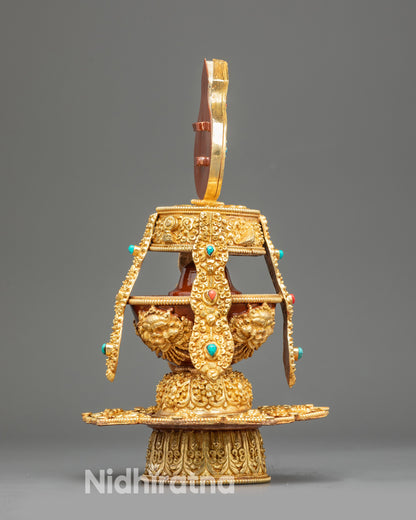 Side view Golden Che Bhumba Vase with curved body and gold-plated pedestal