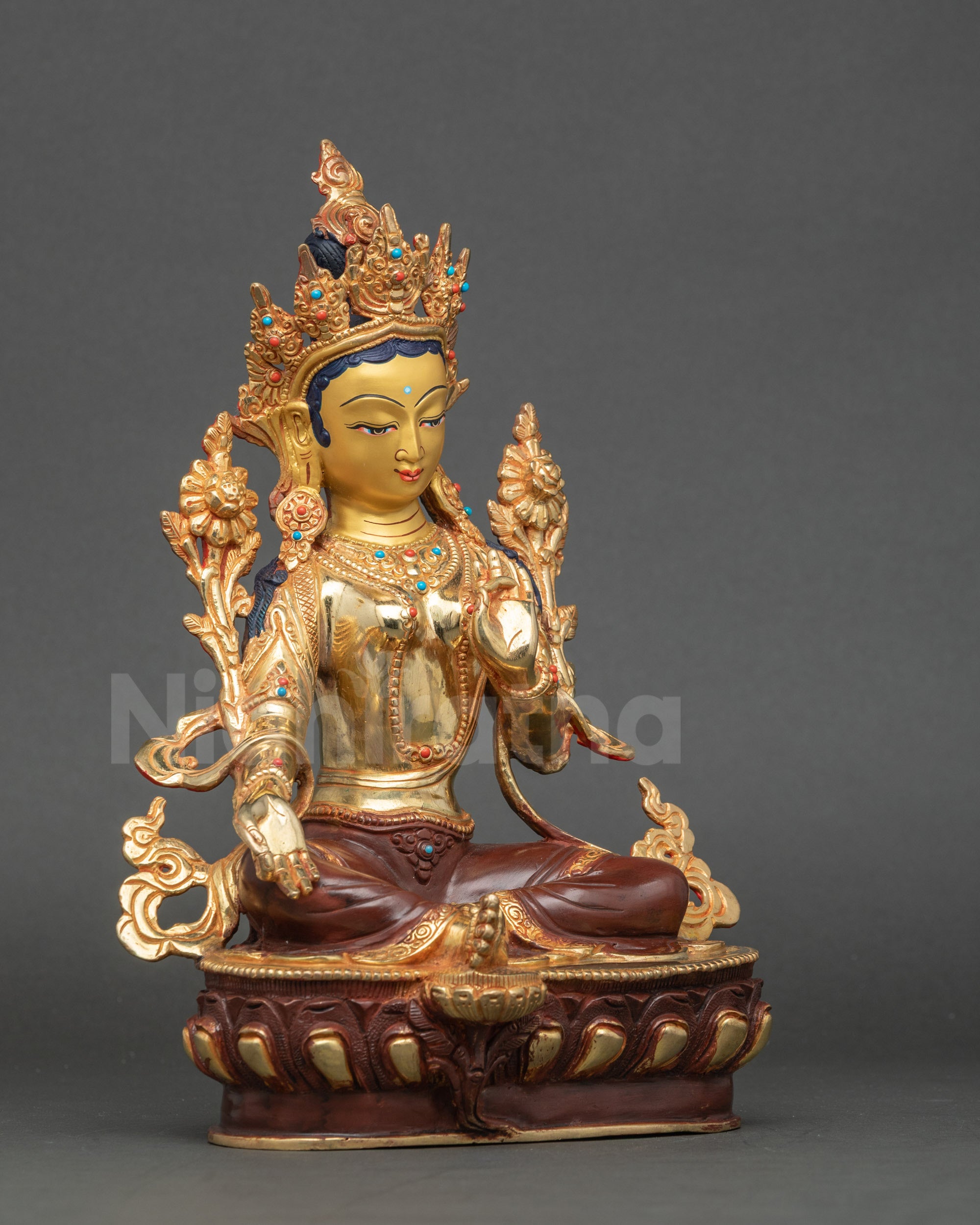 Side view Green Tara Lalitasana posture lotus seat utpala lotus Nepalese statue