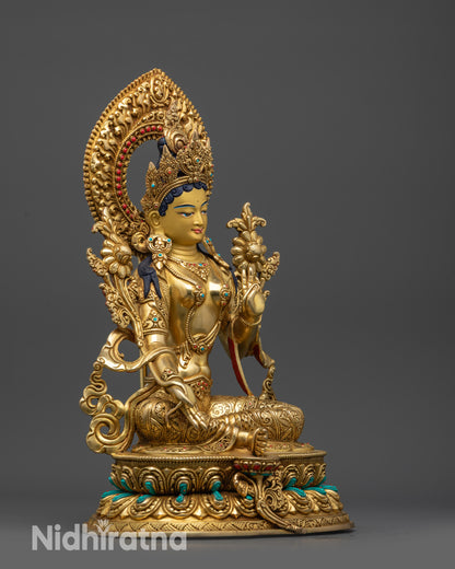 Side view Green Tara Statue with blue lotus and gold-gilded flowing robes craftsmanship