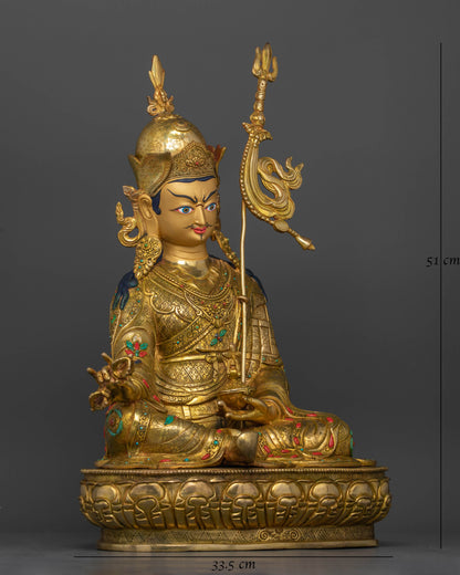 Side view Guru Rinpoche seated royal ease posture hand-carved gold-gilded statue