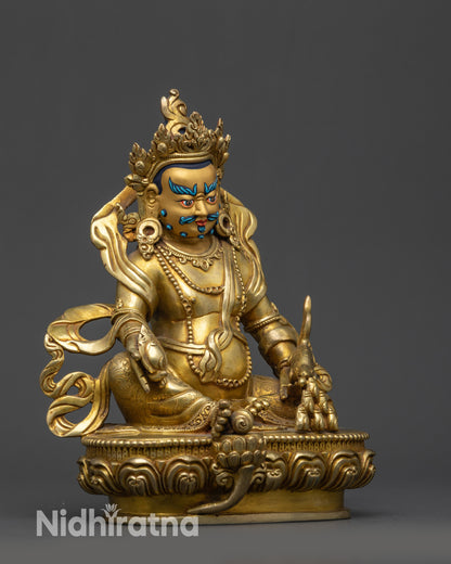 Side view Handcrafted Dzambhala with ornate crown, filigree robes, and jewelry details
