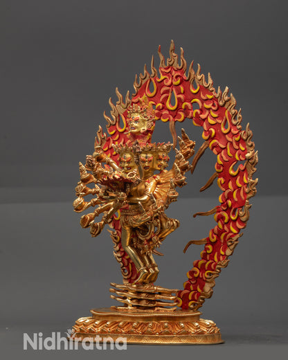 Side view Hevajra Statue with sixteen arms, carved robe and flowing ornaments
