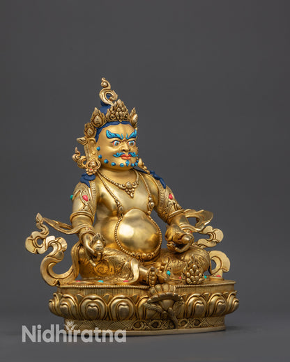 Side view Jambhala Statue seated in royal ease pose holding citron fruits & jewels