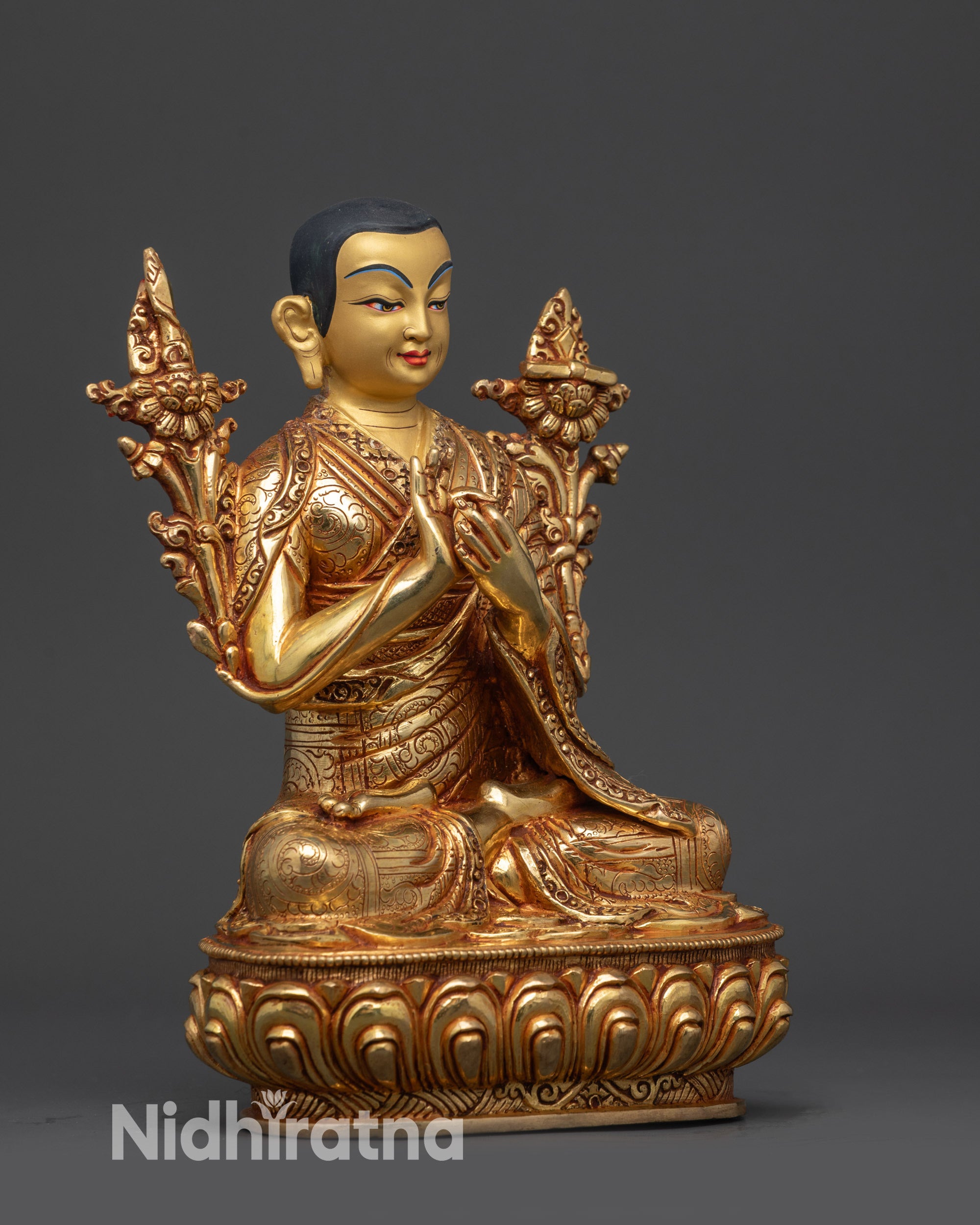 Side view Je Tsongkhapa statue showing Dharmachakra Mudra and lotus seat
