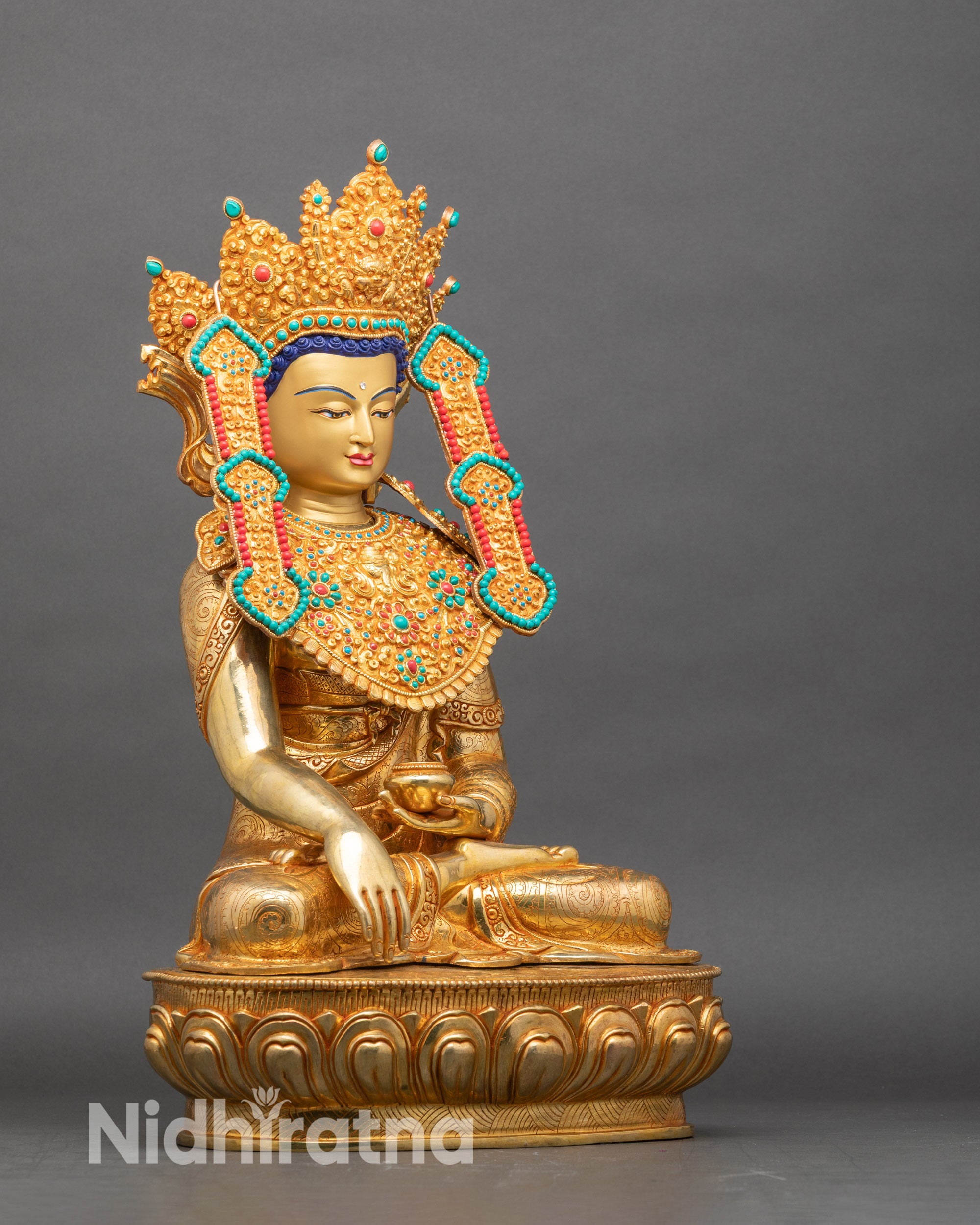 Side view Jowo Rinpoche holding Patra Bowl and Bhumisparsha Mudra seated on double lotus