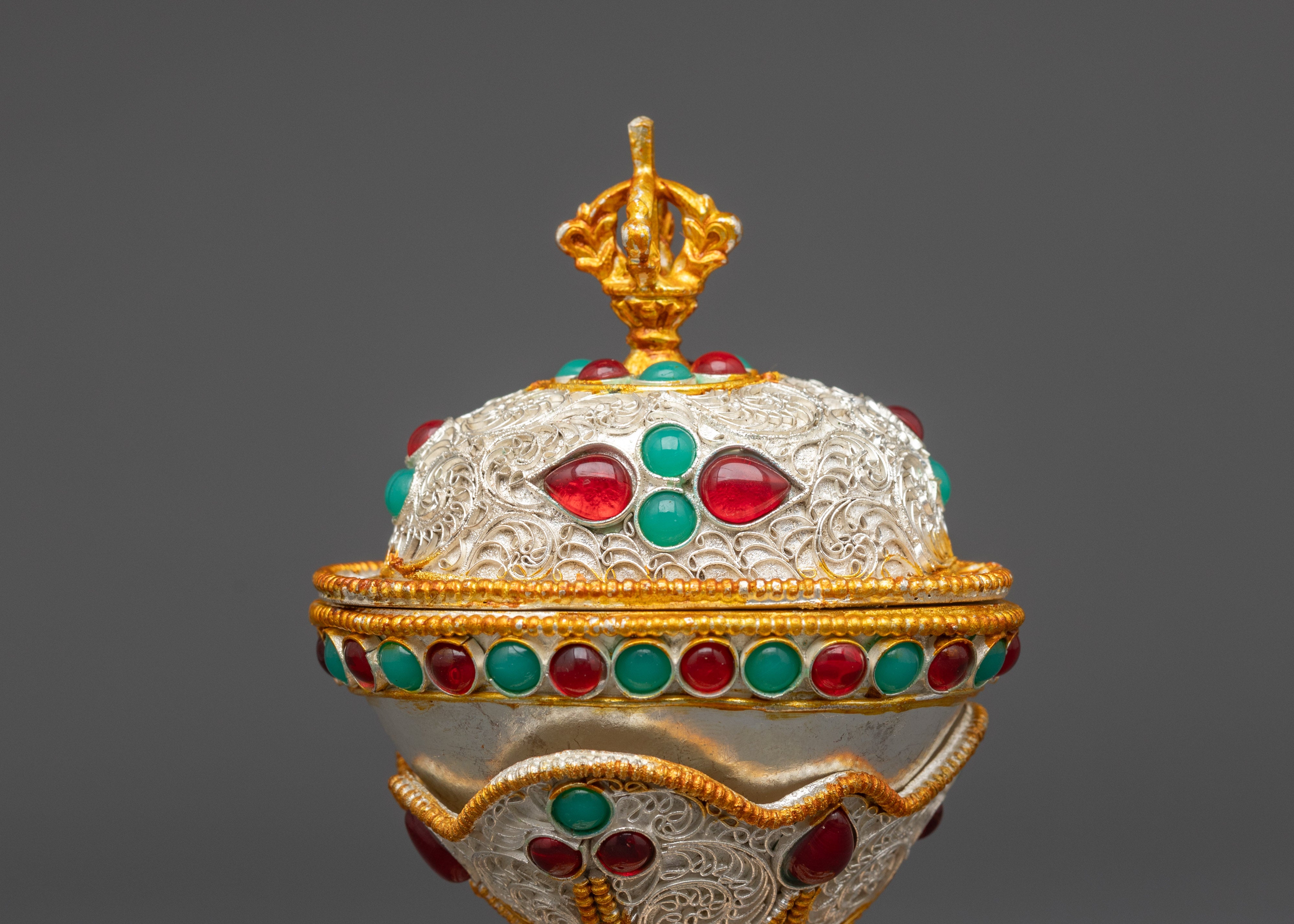 Side view Kapala Set with gold-plated Vajra lid and decorative gemstones