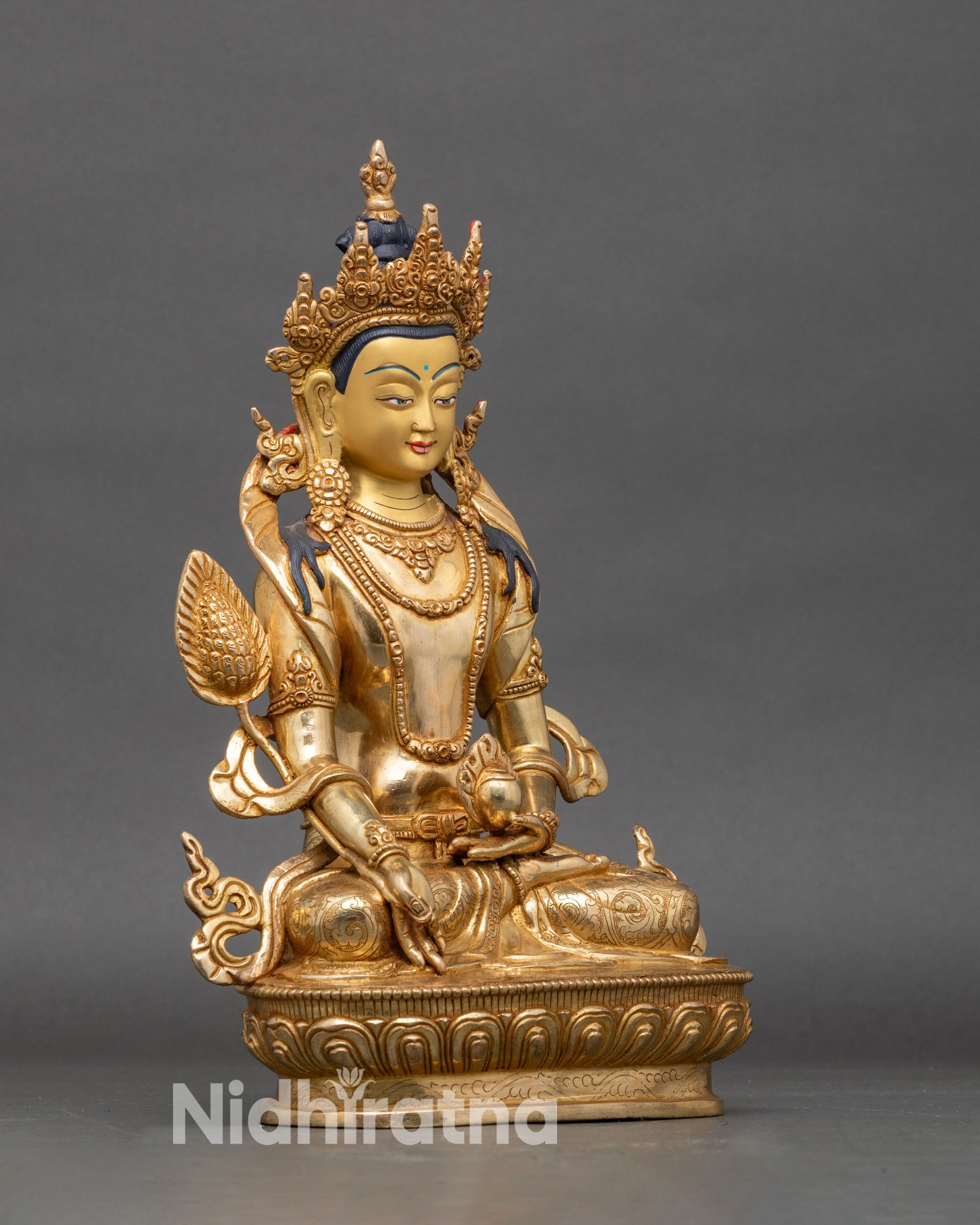 Side view Kshitigarbha statue padmasana pose protective and compassionate deity
