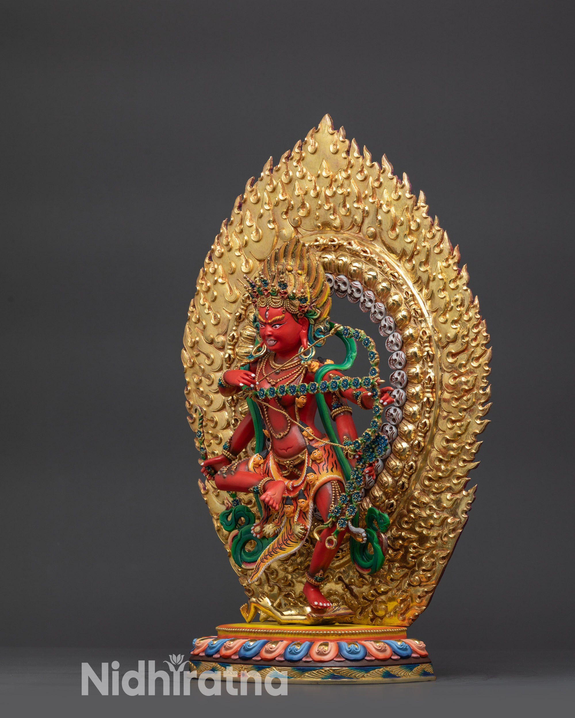 Side view Kurukulla Statue holding flower bow and arrow symbolizing divine energy
