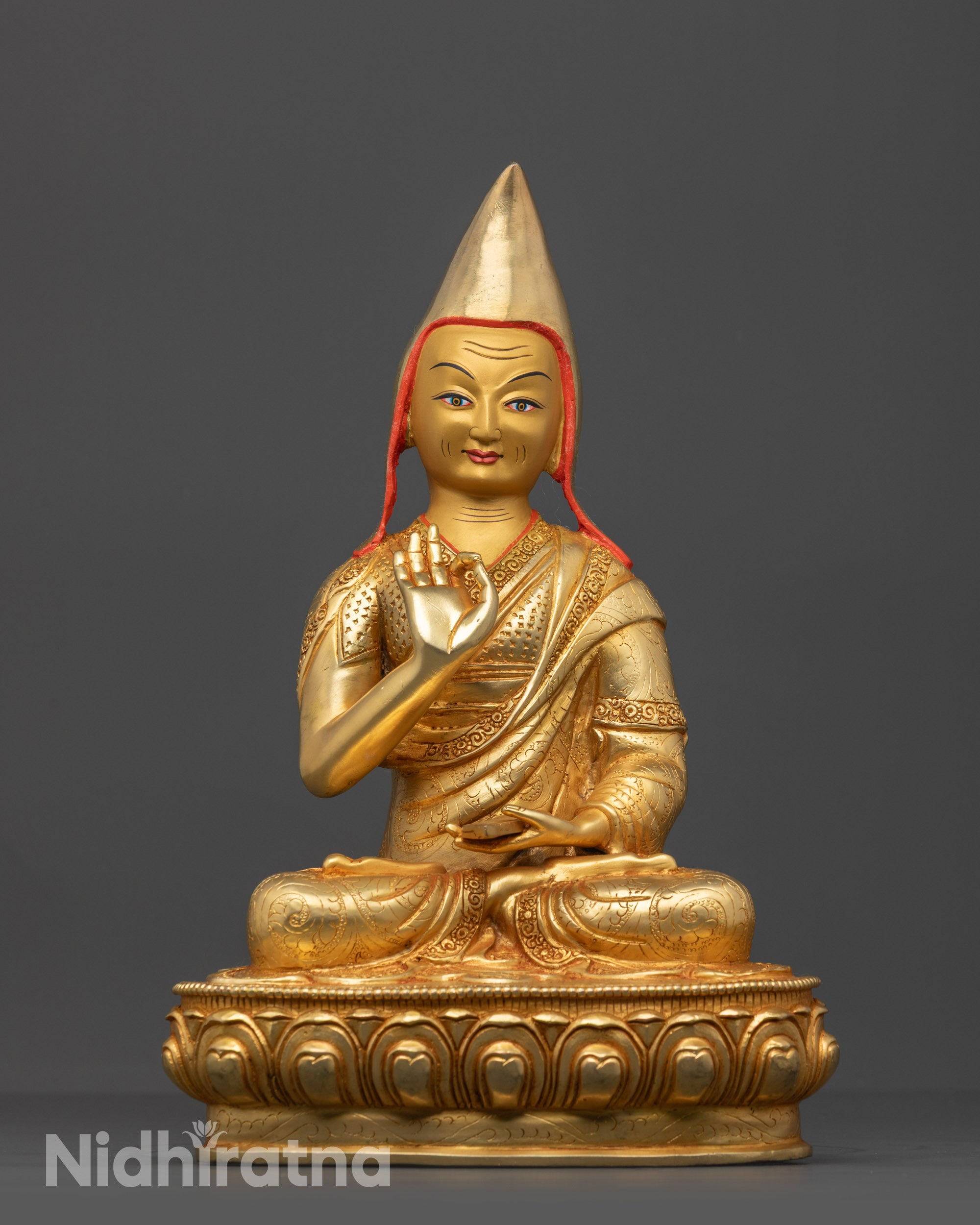 Side view Lama Tsongkhapa set showing yellow pandita hats and intricate robe details
