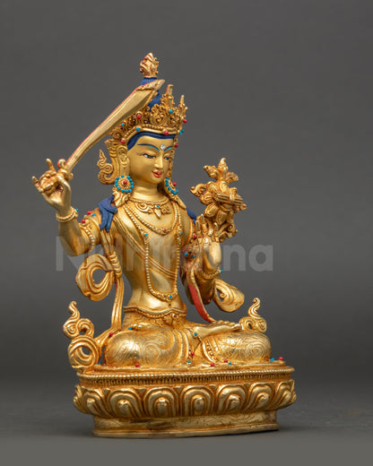 Side view Manjushree Bodhisattva Statue, seated holding flaming sword of wisdom